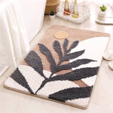 A rug placed beside a bathtub