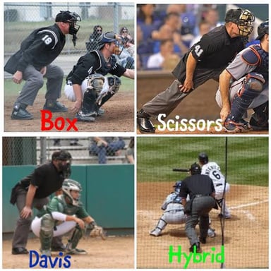 An umpire stands behind the catcher at home plate during a baseball game.