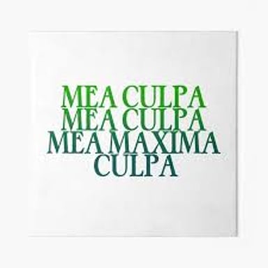 The Latin phrase “mea culpa” written on a page