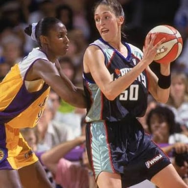 Players competing in a game in the Women’s National Basketball Association.