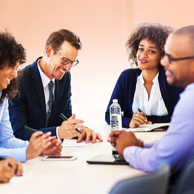 A team leader guiding a group discussion.