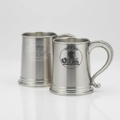 A pewter drinking vessel showing the silvery appearance of the tin-based alloy.