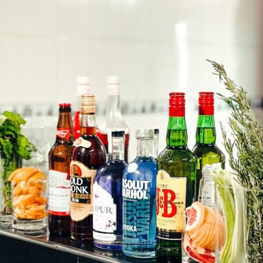 A bar displaying assorted alcoholic beverages