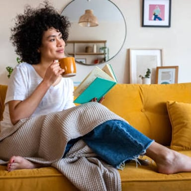 A person enjoying a quiet moment alone with a book.