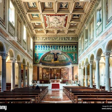 A church interior showing an apse behind the altar