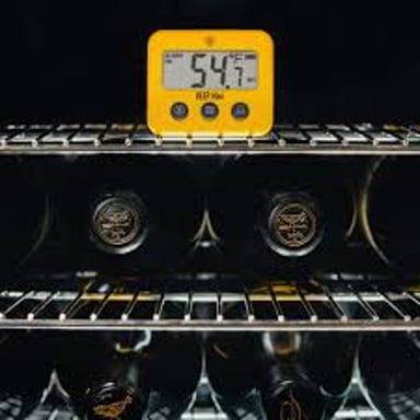 A household appliance showing an alert while sounding a beep