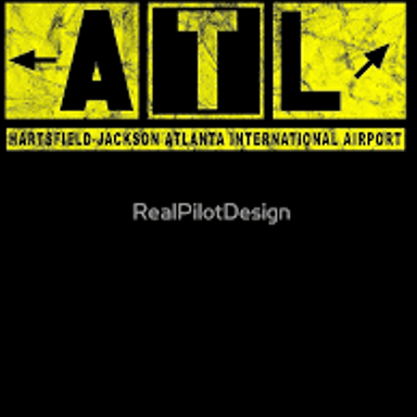 Airport signage identifies Hartsfield-Jackson Atlanta International Airport.