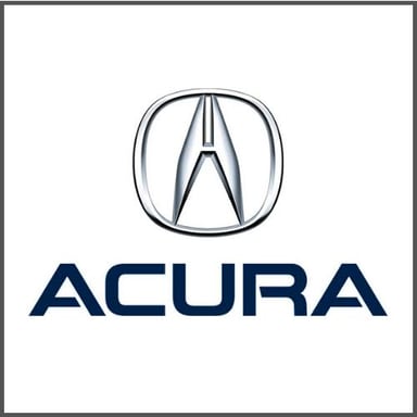 The Acura brand logo on a luxury vehicle.