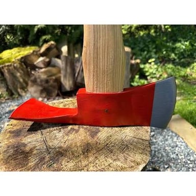 A firefighter’s axe with a heavy metal head and handle.