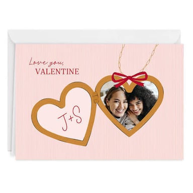 A Valentine's Day card decorated with hearts and a message of love