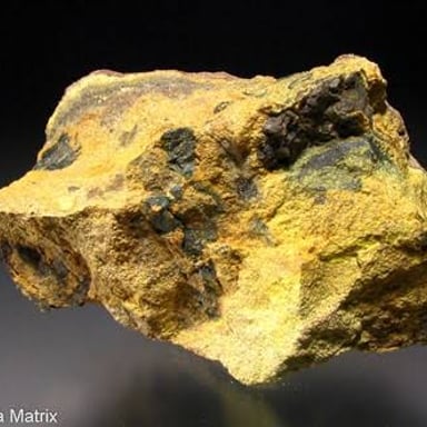 Rock specimen containing visible mineral ore
