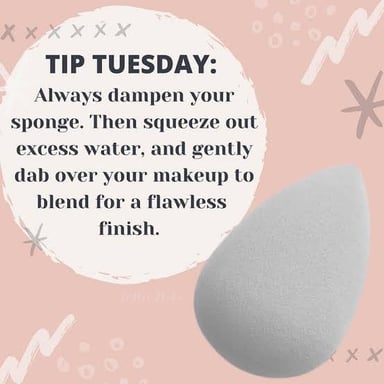 Water soaking into a sponge and making it damp.