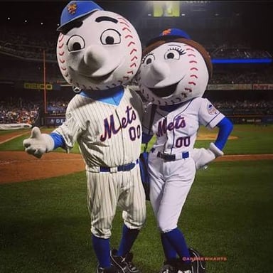The New York Mets mascots Mr. Met and Mrs. Met, each with a baseball-shaped head