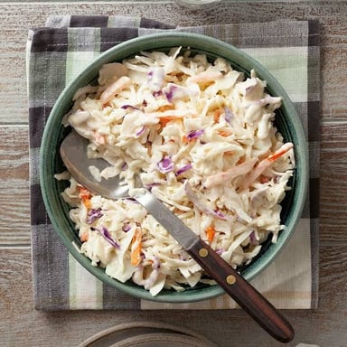 A bowl of shredded cabbage coleslaw