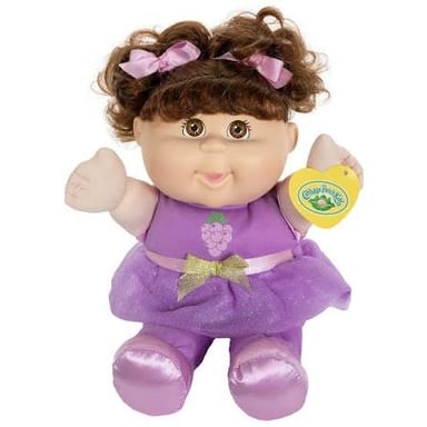 A Cabbage Patch Kids doll with yarn hair and cloth clothing