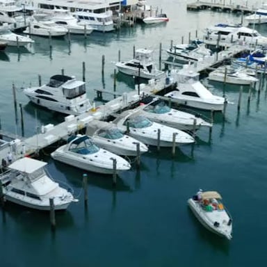 A boat tied securely to a dock