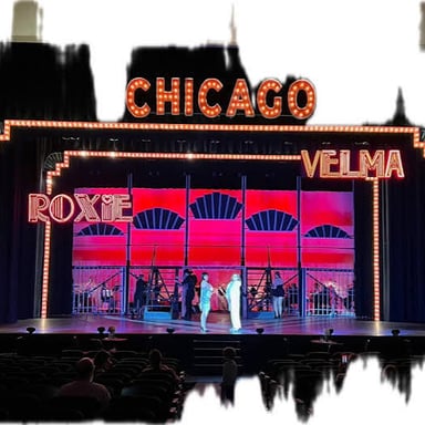A shallow building front on a stage set conceals the space behind it.