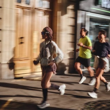 A person running quickly toward a visible destination