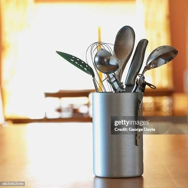 A shiny stainless-steel utensil.