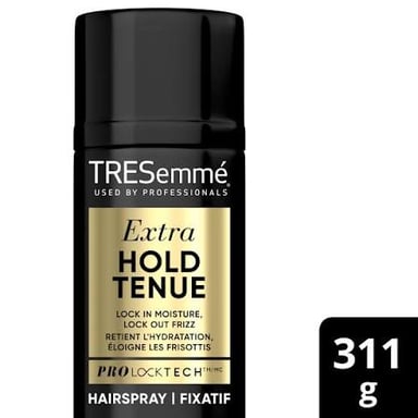 A fine mist of hairspray released from a spray can.