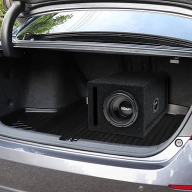 A large subwoofer installed in a car audio system.