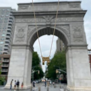 Washington Square Park and its arch beside New York University buildings in Greenwich Village.