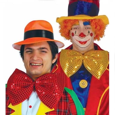 A circus clown wearing a bow tie at the collar.