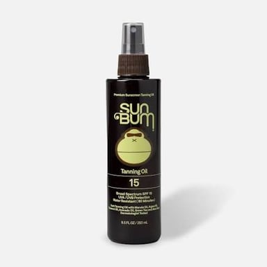 A bottle of tanning oil with an SPF rating on its label.