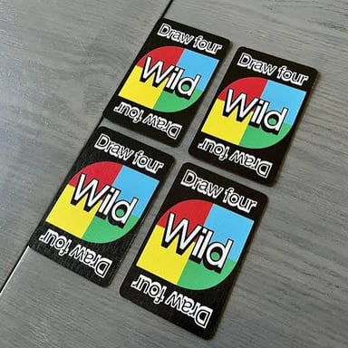 UNO cards including a Wild Draw Four card.