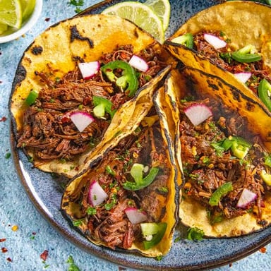 A taco filled with barbacoa-style meat.