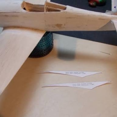 Light balsa wood sheets used to build a model airplane.