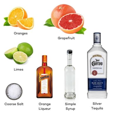 A bottle of triple sec beside a margarita.