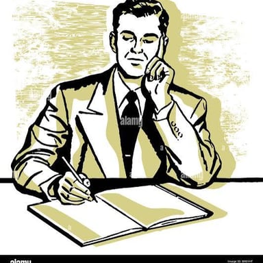 A person concentrating while working at a desk.