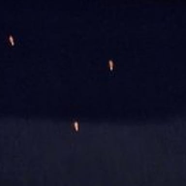 A mysterious unidentified object silhouetted against a night sky