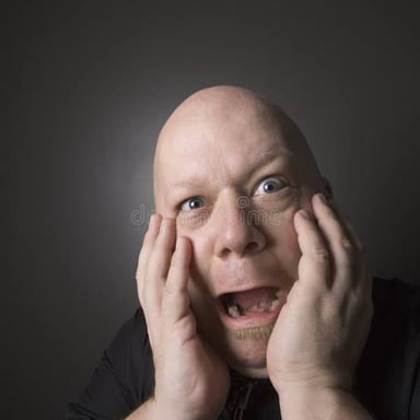 A person showing a shocked and horrified expression
