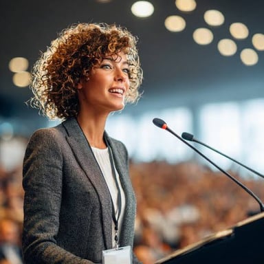 A speaker talking smoothly and confidently to an audience.