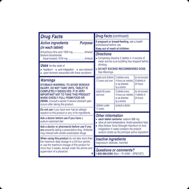 Two tablets beside medication dosage instructions.