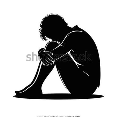 A person lies curled on their side with knees drawn toward the chest.