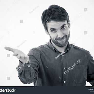A person making a triumphant I-told-you-so gesture.