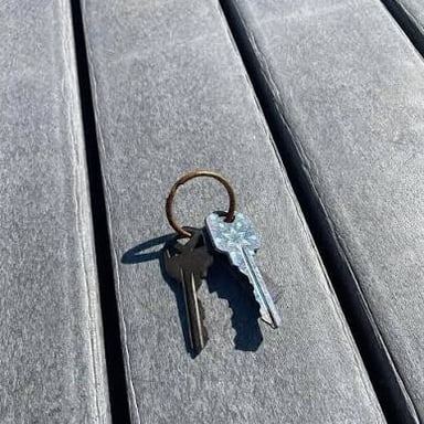 An empty tabletop where someone might have expected to find their keys.