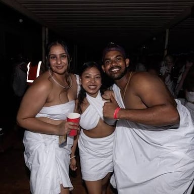 People wearing toga costumes at a college party