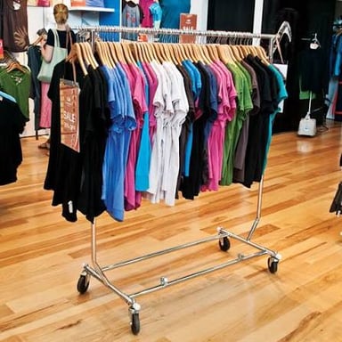Clothing displayed for sale in a retail store.