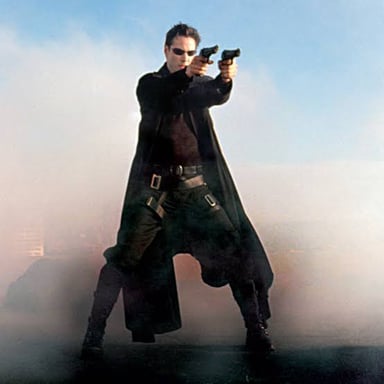 Neo, played by Keanu Reeves, in The Matrix.