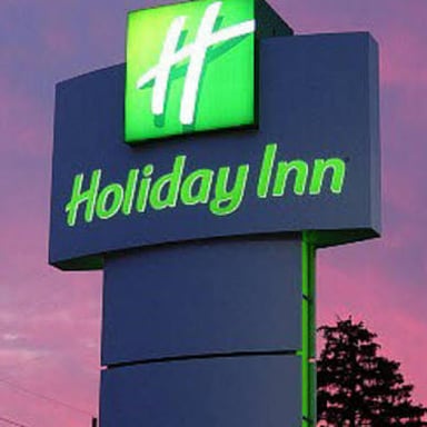 A Holiday Inn hotel sign identifying the lodging brand.