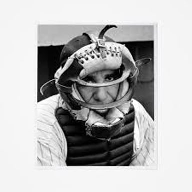 A portrait of baseball player and manager Yogi Berra.