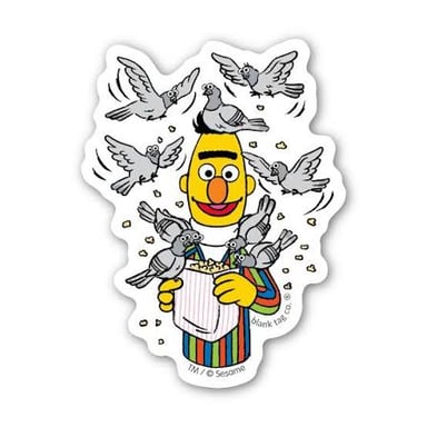 Bert from Sesame Street standing with a pigeon