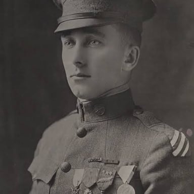 An archival photograph shows soldiers in World War I uniforms.