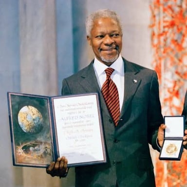 A Nobel Prize medal displayed beside its award diploma.