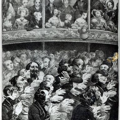An audience applauding a performer after a show