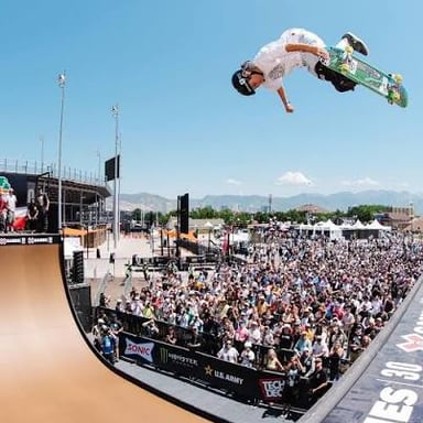 A person celebrating an exciting extreme-sports moment